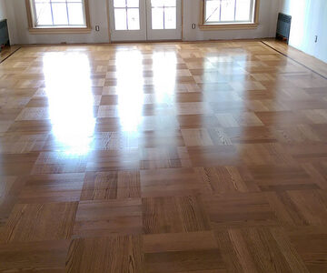 Hardwood floor installation — new parquet floor in a residence