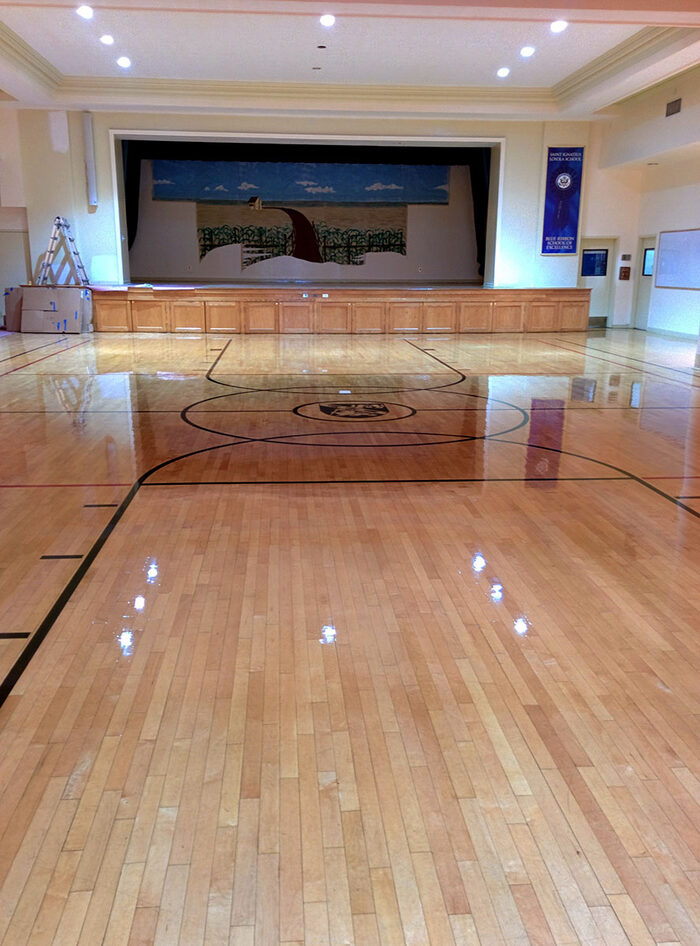 Auditorium stage and hardwood floor, commercial project