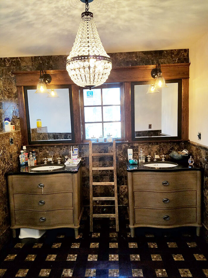 Custom wood flooring in a designer bathroom